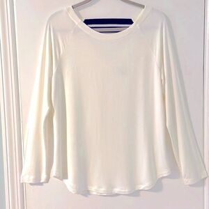 Cabi top open back detail in cream color with raglan long sleeves tunic size M